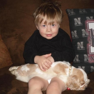 My nephew Jj holding a very worn out Charlie.